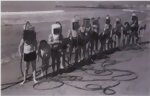 Postcard - Schoolboys Wearing Homemade open shallow water diving helmet, February 21, 1935